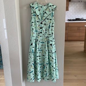 Voodoo Vixen medium sleeveless midi dress in mint green with cat print.